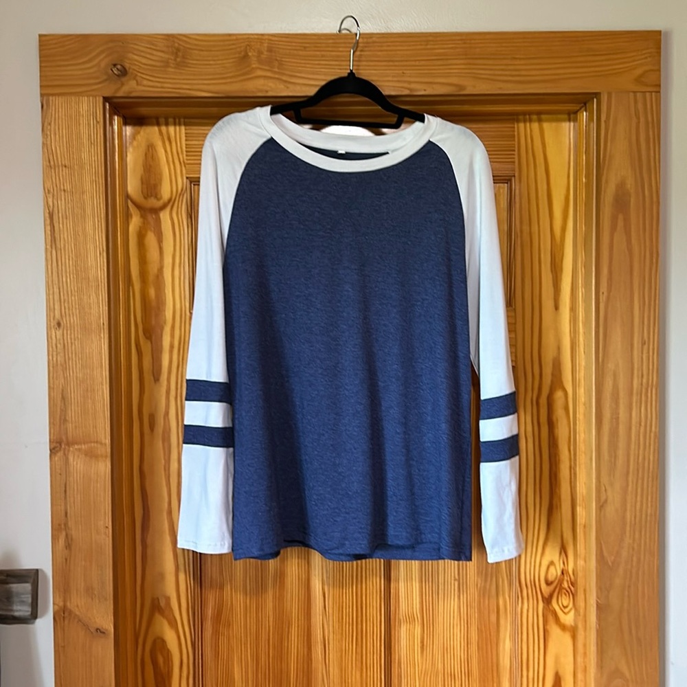 Long sleeve blue and white t-shirt.